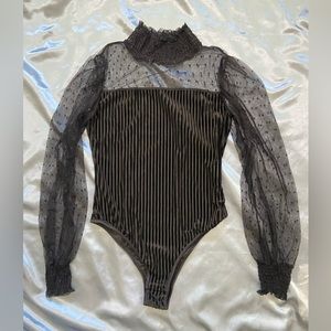 Sheer Ribbed Long Sleeve Bodysuit. New